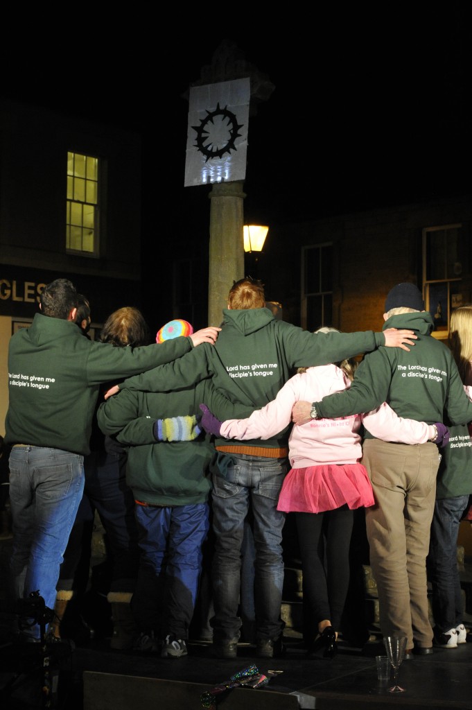 Looking up in hope at the symbol. Image courtesy of North East Press